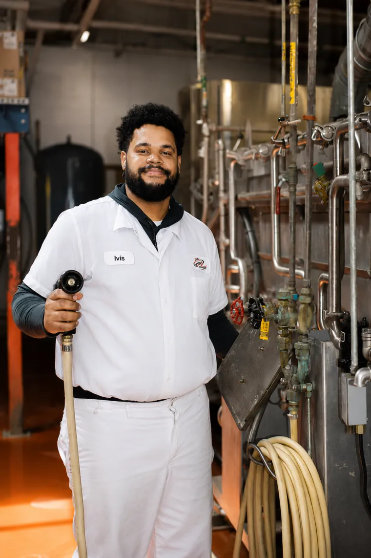 Munroe Dairy plant employees on the production floor